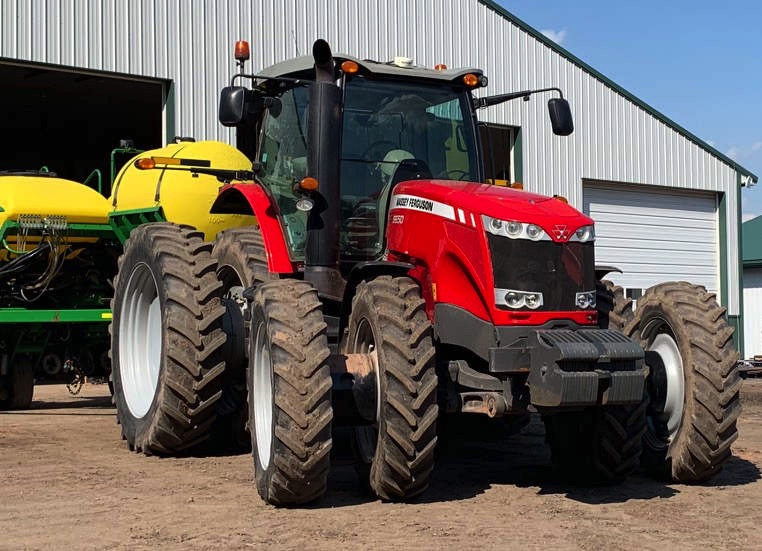 A tractor getting ready to start planting on the family farm.